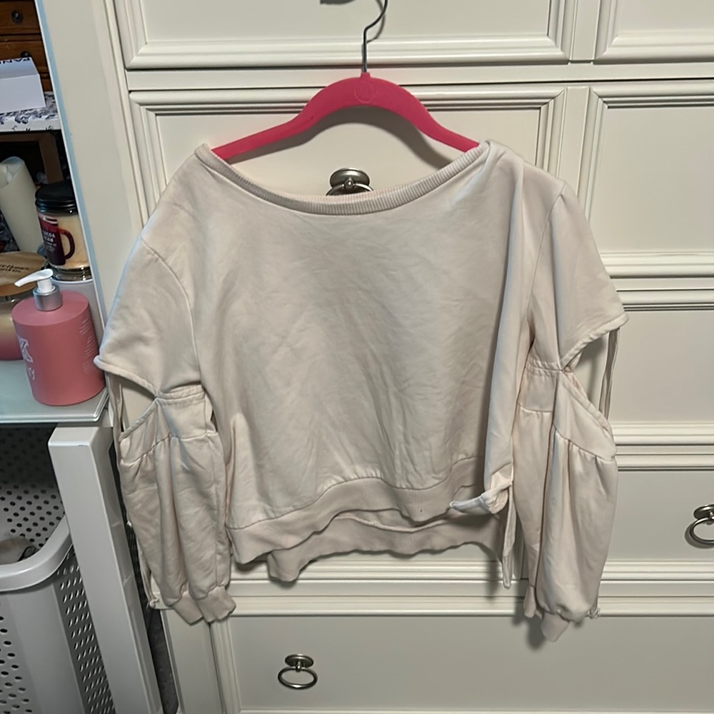 Tan Long sleeve shirt that is one size but would be between a small & a medium!